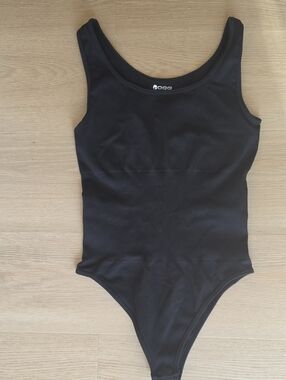 Black body of the OQQ brand For women